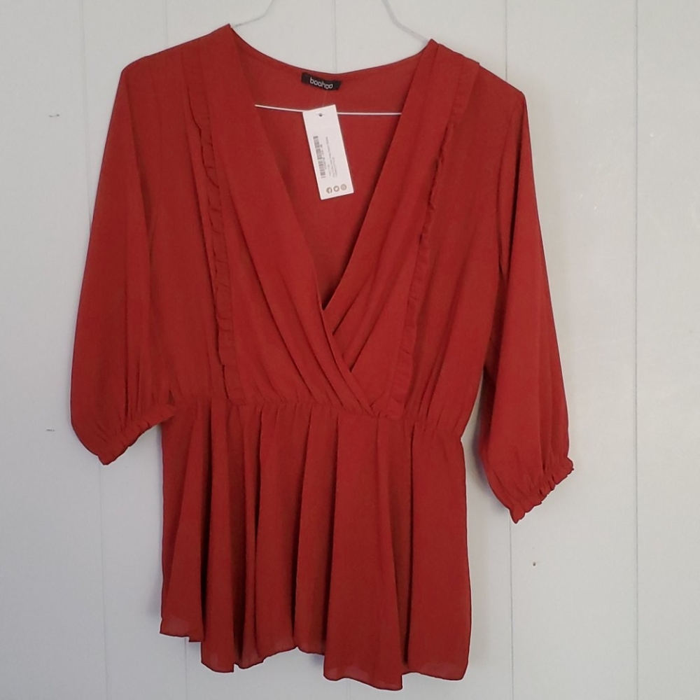 Plus ruffle detail wrap peplum blouse